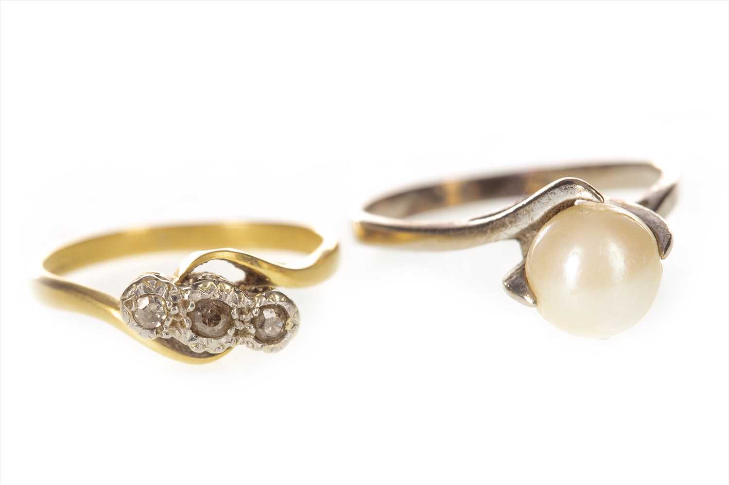 Lot 375 - A DIAMOND THREE STONE RING AND A PEARL RING