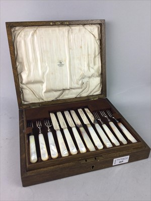 Lot 469 - A SET OF TWELVE MOTHER OF PEARL HANDLED PLATED FRUIT KNIVES AND FORKS