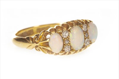Lot 405 - AN OPAL AND DIAMOND RING