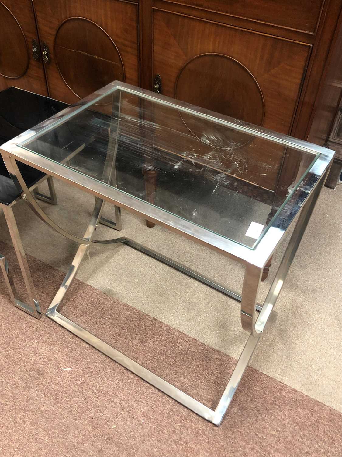 Lot 563 - A NEST OF TWO MODERN GLASS TOPPED TABLES AND ANOTHER TABLE