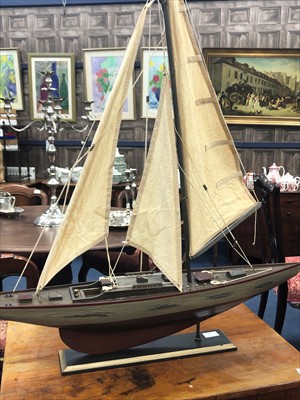 Lot 526 - A MID CENTURY MODEL OF A SAILING SHIP ON STAND