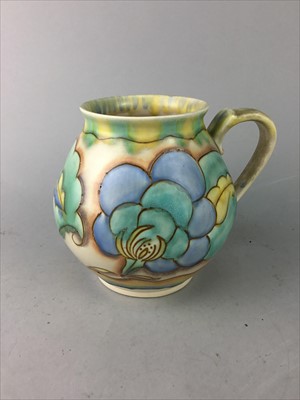 Lot 542 - A CARLTON WARE JUG