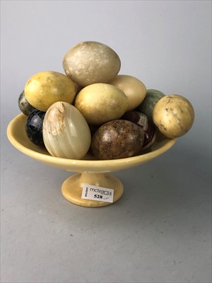 Lot 528 - A LOT OF ONYX EGGS ON A STAND, CRYSTAL BOWL AND GLASS SWEETS