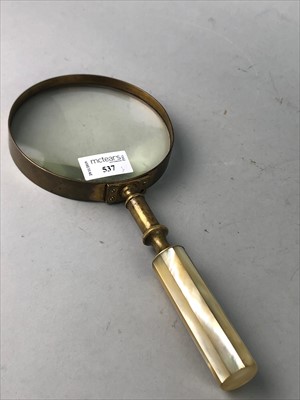 Lot 537 - A LARGE MAGNIFYING GLASS AND TWO SHIPS IN BOTTLES