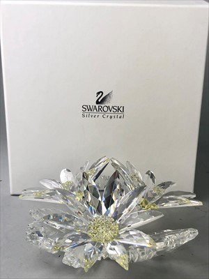 Lot 515 - A SWAROVSKI CRYSTAL GROUP OF THREE FLOWERS