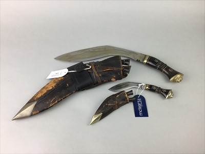 Lot 206 - A KUKRI KNIFE AND A SMALLER KUKRI (2)