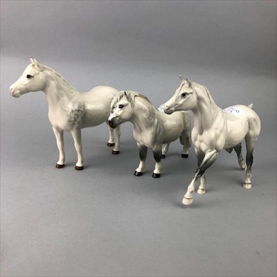 Lot 49 - A BESWICK CONNEMARA PONY AND TWO ROYAL DOULTON PONIES