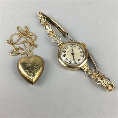 Lot 1 - A NINE CARAT GOLD WATCH AND A LOCKET