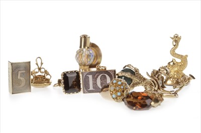 Lot 432 - A LOT OF GOLD CHARMS
