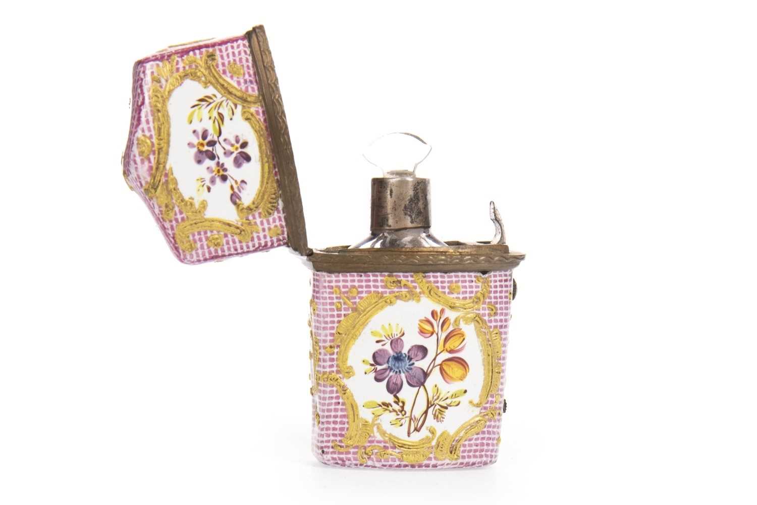Lot 1303 - A LATE 19TH CENTURY FLORAL PORCELAIN AND ENAMEL PAINTED CASED PERFUME BOTTLE