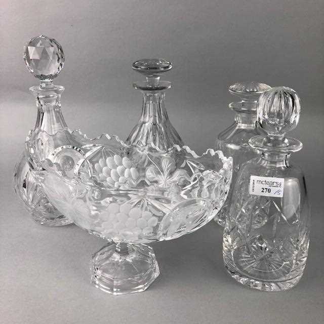 Lot 270 - A CRYSTAL BOWL AND FOUR CRYSTAL DECANTERS