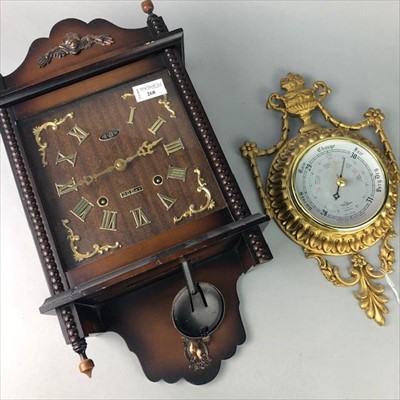 Lot 268 - A PRESIDENT 30 DAY WALL CLOCK AND A BAROMETER