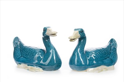 Lot 1051 - A PAIR OF CHINESE BLUE GLAZED DUCKS