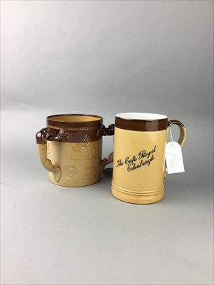 Lot 142 - A DOULTON LAMBETH THREE HANDLED CUP AND ANOTHER