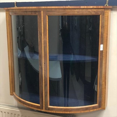 Lot 155 - A SATINWOOD BORDERED BOWFRONTED WALL MOUNTING DISPLAY CABINET
