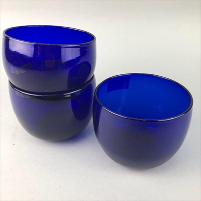 Lot 174 - A SET OF TEN BLUE GLASS CIRCULAR BOWLS