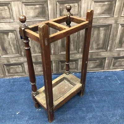 Lot 180 - AN EARLY 20TH CENTURY OAK STICK STAND