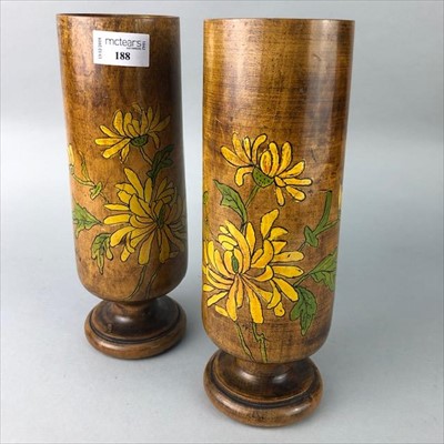 Lot 188 - A PAIR OF STAINED WOOD CANDLESTICKS