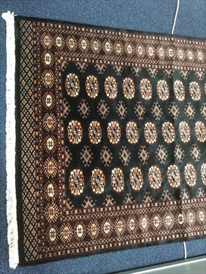 Lot 1023 - A LOT OF TWO MIDDLE EASTERN RUGS