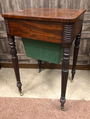 Lot 1670 - A POST REGENCY MAHOGANY AND ROSEWOOD CROSSBANDED NEEDLEWORK TABLE