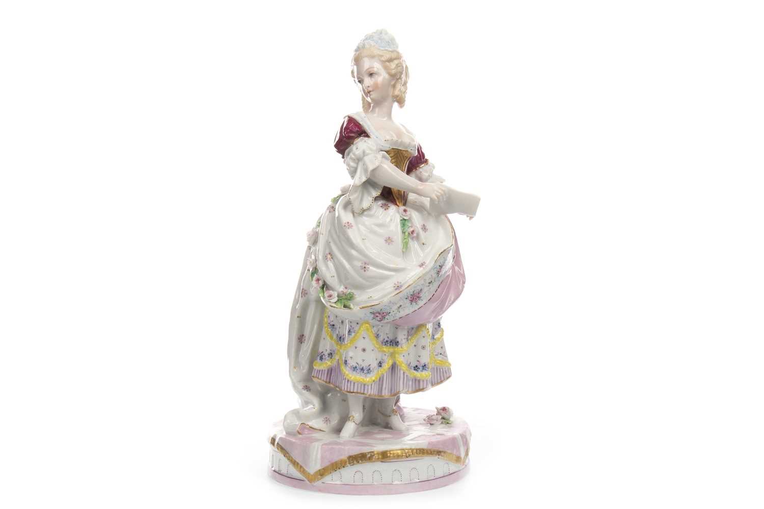 Lot 1312 - A 19TH CENTURY CONTINENTAL PORCELAIN FIGURE OF A LADY