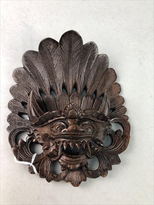 Lot 78 - A LOT OF CARVED WOOD WALL MASKS AND A BOX