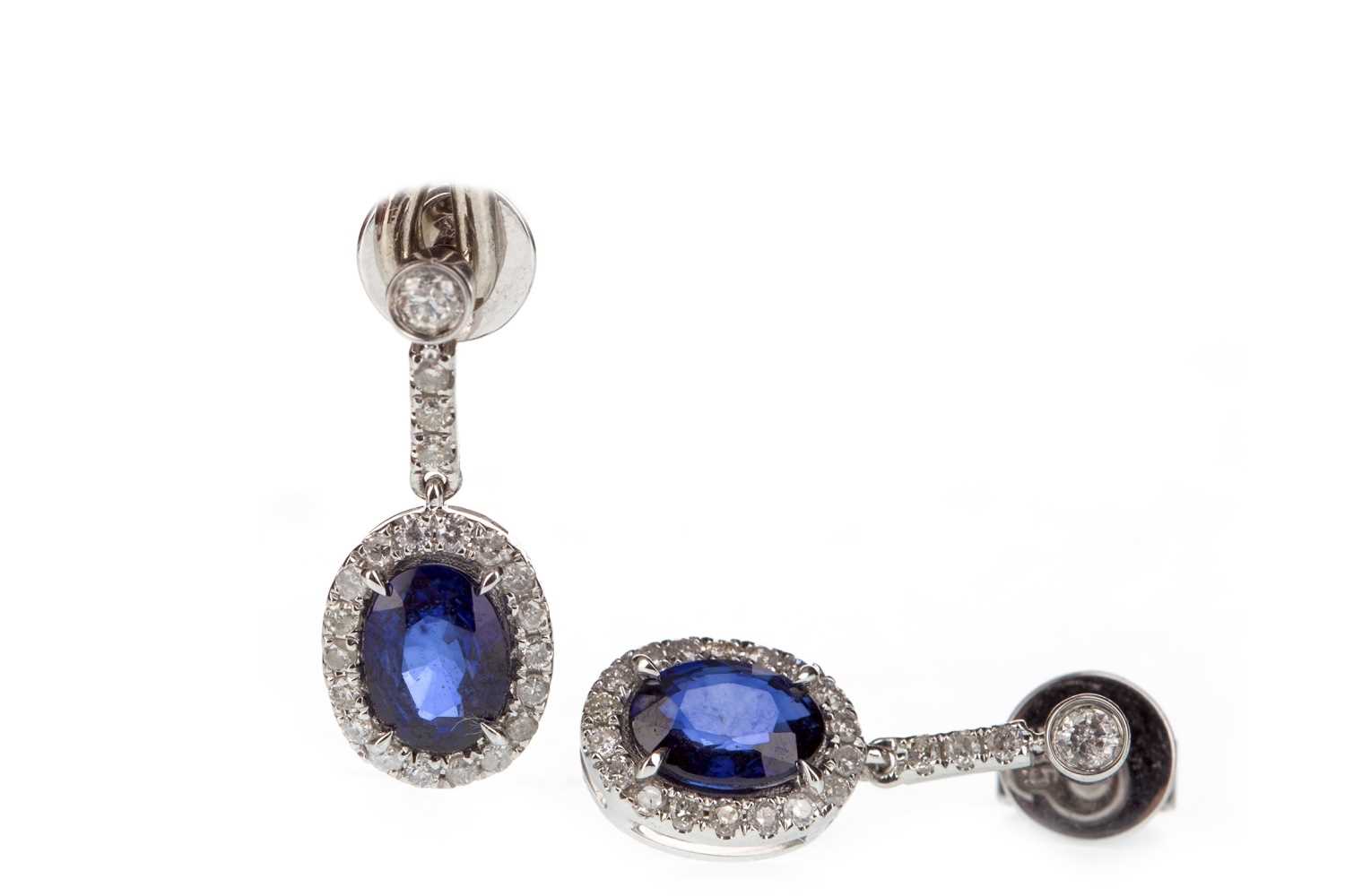 Lot 283 - A PAIR OF SAPPHIRE AND DIAMOND EARRINGS