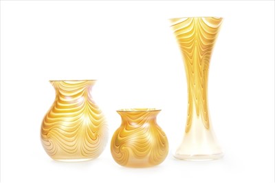 Lot 1327 - AN OKRA GLASS VASE ALONG WITH TWO OTHERS