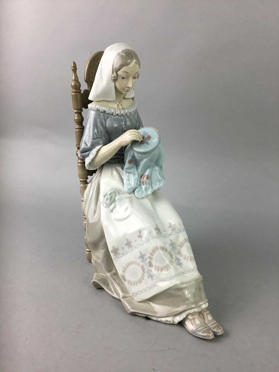 Lot 339 - A LLADRO FIGURE OF AN EMBROIDERER