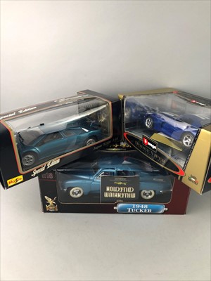 Lot 100 - A COLLECTION OF TEN BOXED MODEL VEHICLES