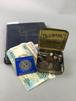 Lot 325 - AN ALBUM OF EARLY 20TH CENTURY STAMPS ALONG WITH COINS