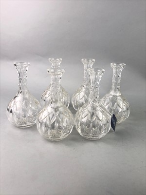 Lot 348 - A SET OF SIX CUT GLASS DECANTERS AND OTHER GLASS WARE