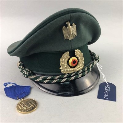 Lot 359 - A REPRODUCTION THIRD REICH MEDAL ALONG WITH A CAP