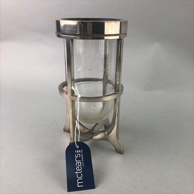 Lot 361 - A SILVER PLATED AND GLASS CANDLE STAND