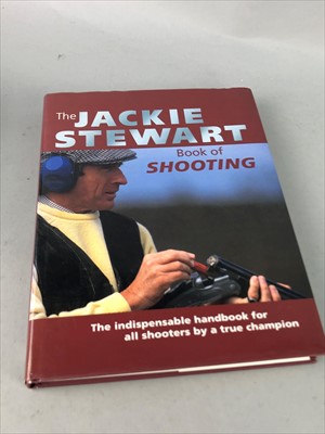 Lot 218 - JACKIE STEWART INTEREST - SIGNED BOOK, PHOTOGRAPHS AND OTHER ITEMS