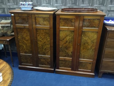 Lot 473 - A PAIR OF EARLY 20TH CENTURY WALNUT CUPBOARDS