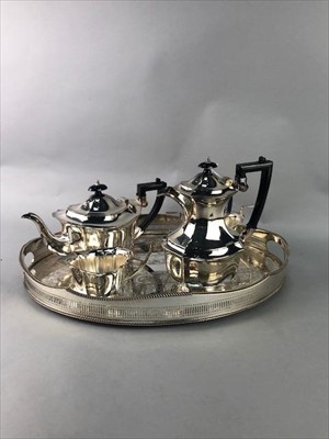 Lot 465 - A SILVER PLATED THREE PIECE TEA SERVICE