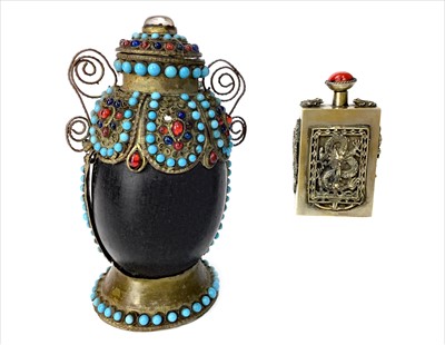 Lot 1058 - A CHINESE WHITE METAL SNUFF BOTTLE AND ANOTHER SNUFF BOTTLE