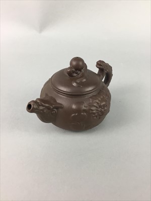 Lot 135 - A SMALL CHINESE YI XING TERRACOTTA MOULDED TEAPOT