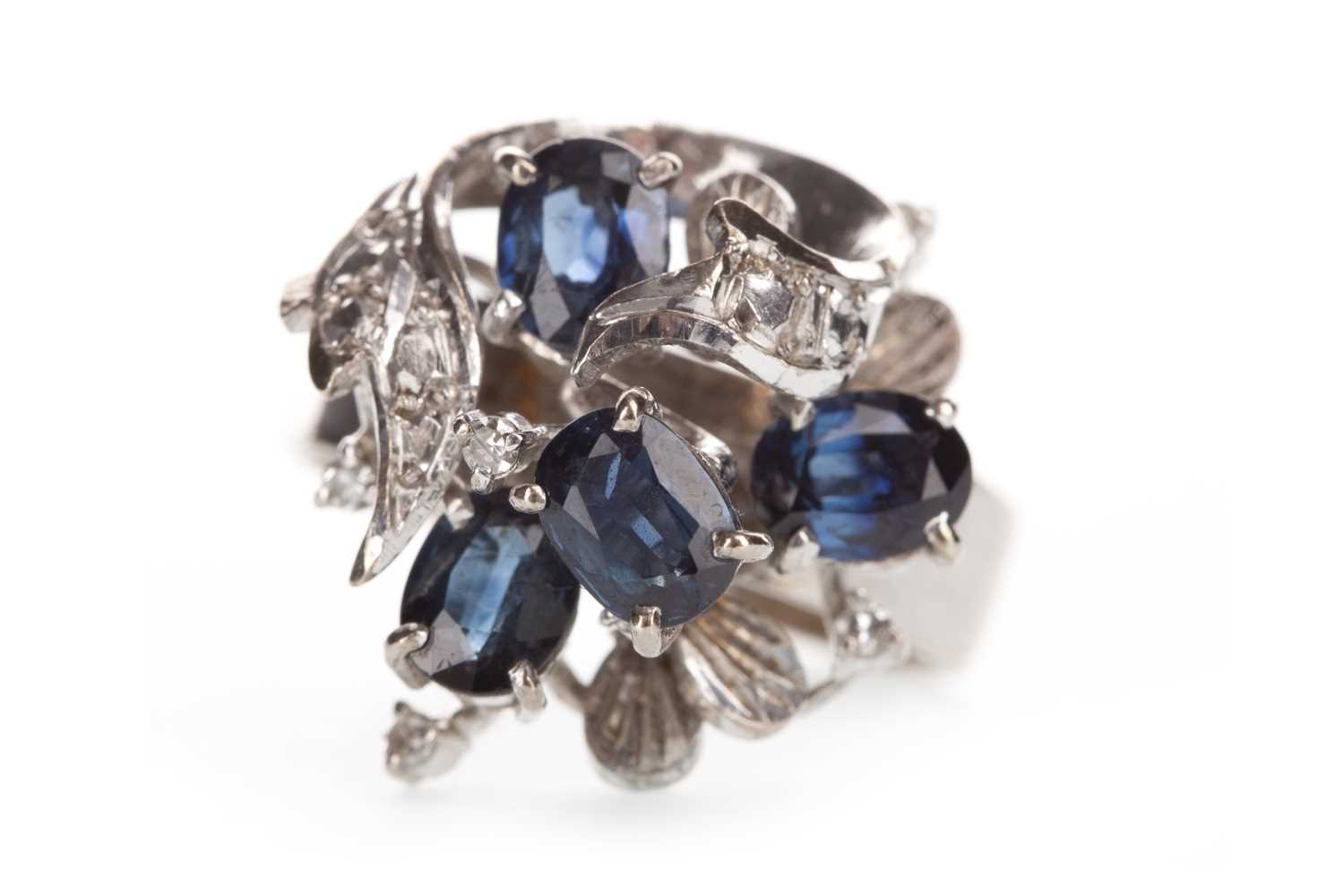 Lot 327 - A BLUE GEM AND DIAMOND COCKTAIL RING