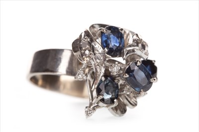 Lot 327 - A BLUE GEM AND DIAMOND COCKTAIL RING