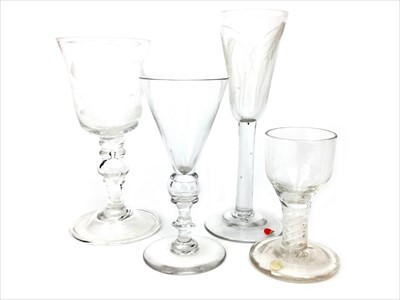 Lot 1333 - A MID-18TH CENTURY FIRING GLASS ALONG WITH THREE OTHER GLASSES