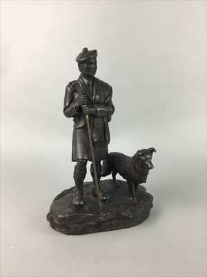 Lot 46 - A BRONZED RESIN SCULPTURE OF A MAN AND DOG