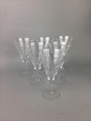 Lot 28 - A SET OF SIX CUT GLASS WINE GLASSES ALONG WITH OTHER GLASSES