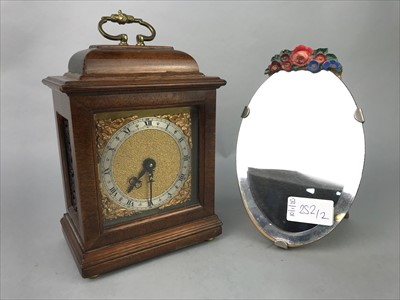 Lot 252 - A REPRODUCTION MANTLE CLOCK AND A SMALL BARBOLA MIRROR
