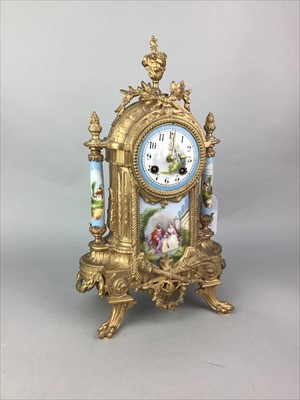 Lot 244 - A VICTORIAN GILT METAL MANTEL CLOCK