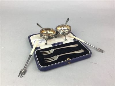 Lot 259 - A SET OF TWO SILVER PICKLE FORKS, TWO OTHERS AND TWO CONDIMENT DISHES