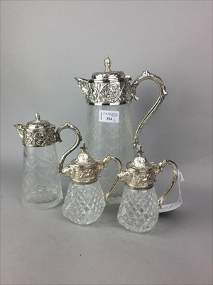 Lot 254 - A GRADUATED SET OF TWO CLARET JUGS AND TWO SMALL CLARET JUGS