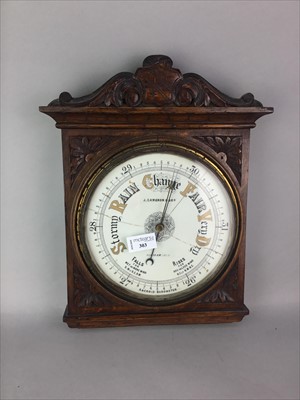 Lot 303 - A VICTORIAN OAK WALL BAROMETER