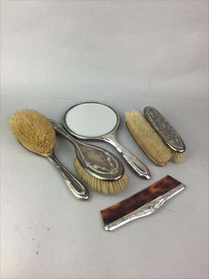 Lot 307 - A SILVER BACKED SIX PIECE DRESSING TABLE SET